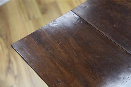 A George III mahogany drop leaf spider leg table, extended W.3ft